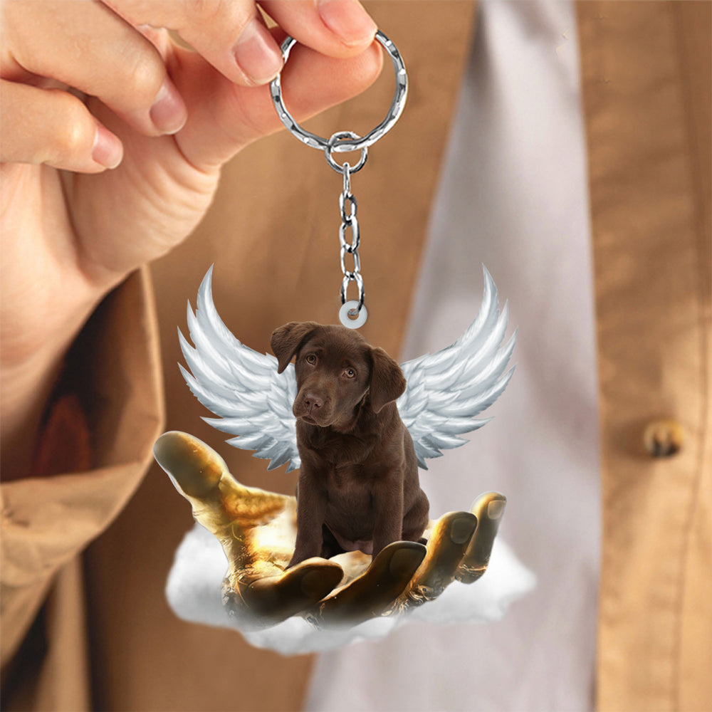 Chocolate Labrador On The Hands Of Jesus Key chain