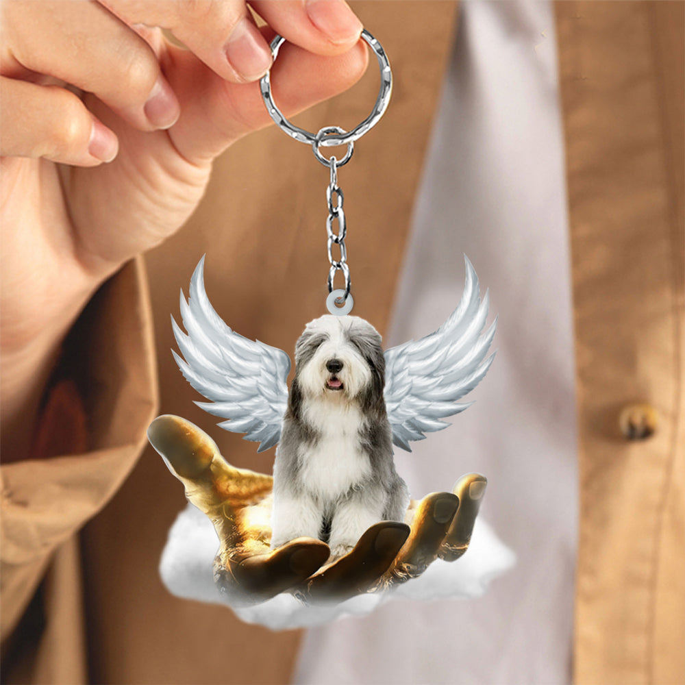 Old English Sheepdog On The Hands Of Jesus Key chain