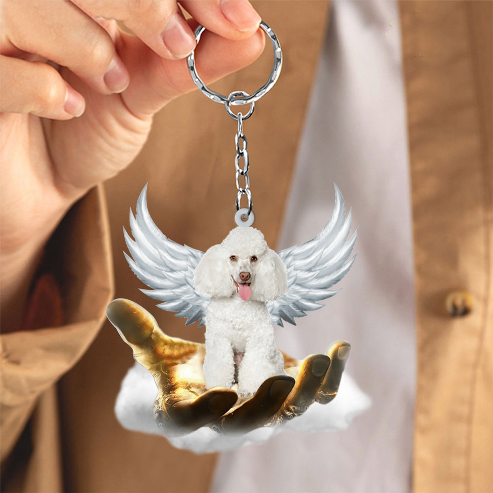 Poodle On The Hands Of Jesus Key chain