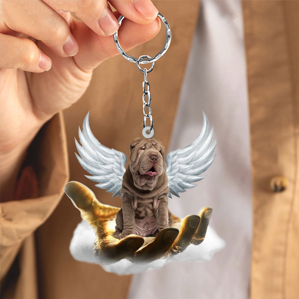 Shar Pei On The Hands Of Jesus Key chain