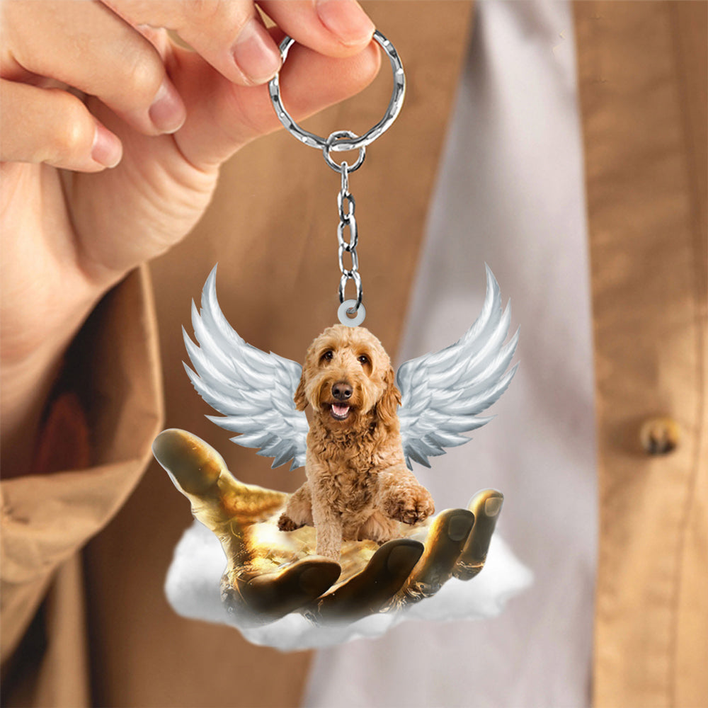 Goldendoodle On The Hands Of Jesus Key chain