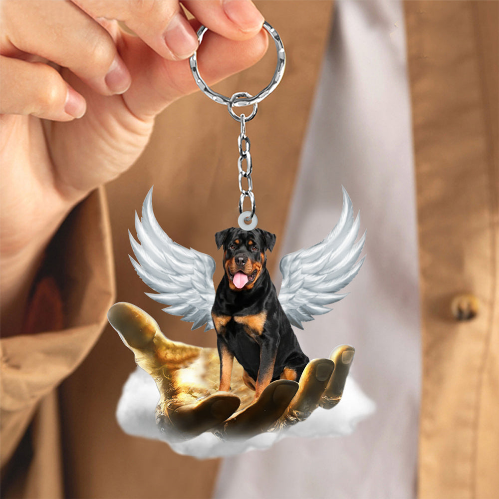 Rottweiler On The Hands Of Jesus Key chain