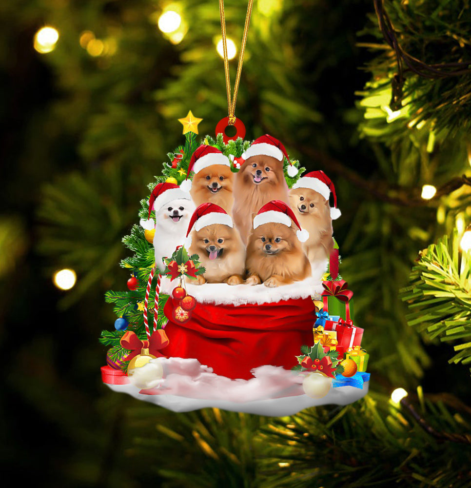 Pomeranian Dogs In A Gift Bag Christmas Ornament