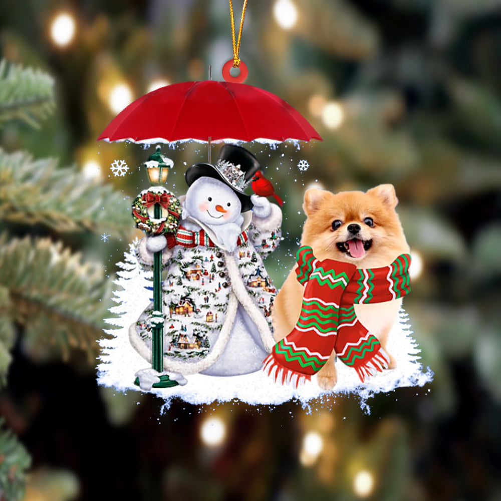 Pomeranian With Snowman Christmas Ornament