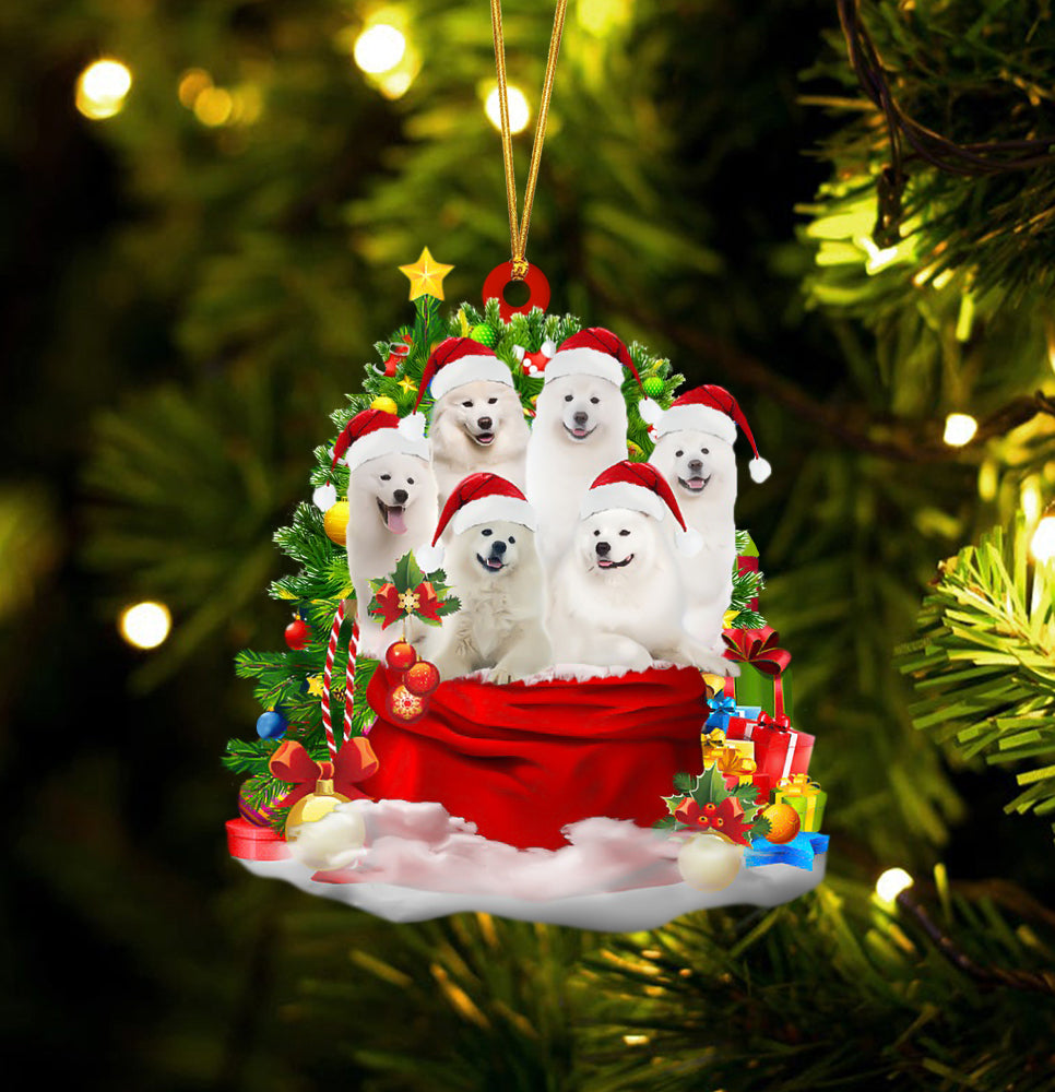 Samoyed Dogs In A Gift Bag Christmas Ornament